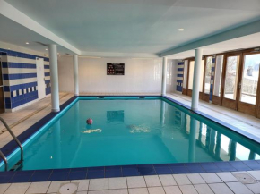 Bel appartement avec piscine couverte et hammam